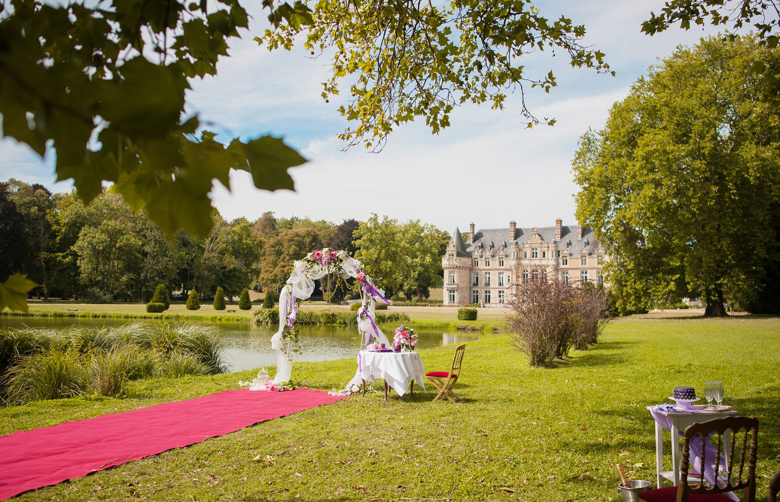 Wedding,Ceremony,At,A,French,Chateau ,Wedding,Arch,With,Flowers